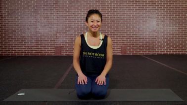 Hye Jin Kalgaonkar of the Hot Room yoga studio teaching online class.