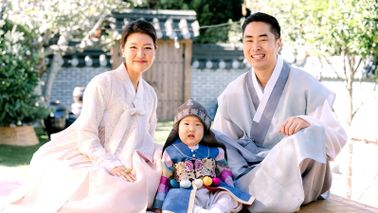 Rich Woo and family celebrating son's first birthday