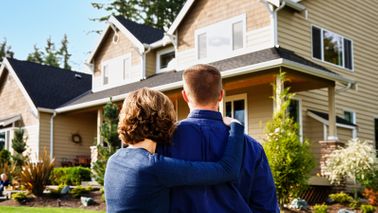 How to buy your dream home couple looking at a house