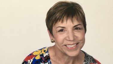 Headshot of woman who built a successful career 