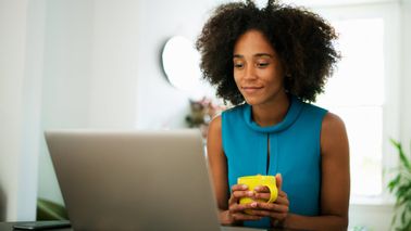 woman researching roth ira contributions for 2025