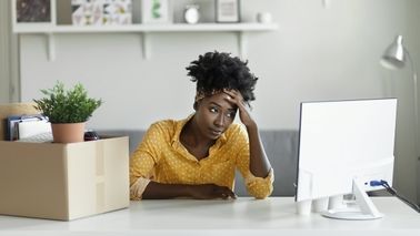 Woman thinking about severance pay.