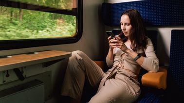 Woman reading Northwestern Mutual’s Weekly Market Commentary.