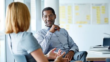 Financial team working together in an office meeting