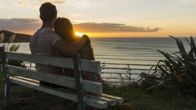 couple-watching-sunset-when-a-loved-one-dies