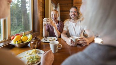 Couple that has moved in with parents to save money.