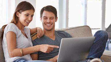 Couple reading the year-end financial checklist.
