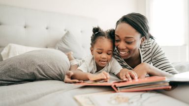 mom reading to her child