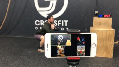 Chase Ford hosting an online class at his gym, CrossFit One Shot.