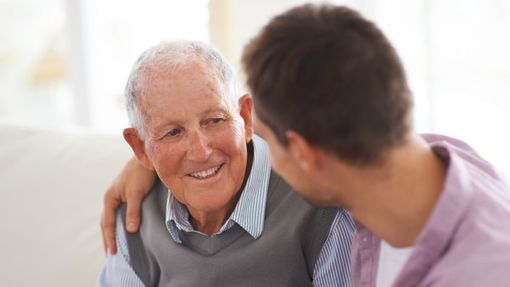 Father and son determining long-term care should be part of financial plan